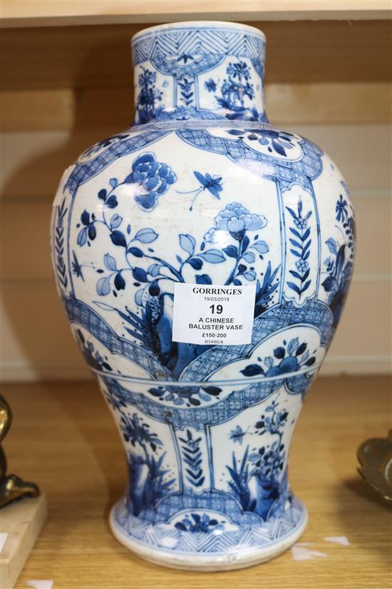 A Chinese blue and white baluster vase 30cm.